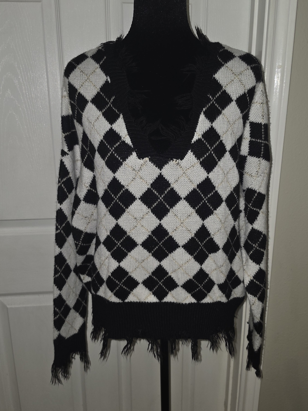 Frayed V-Neck Argyle Sweater in Black and White